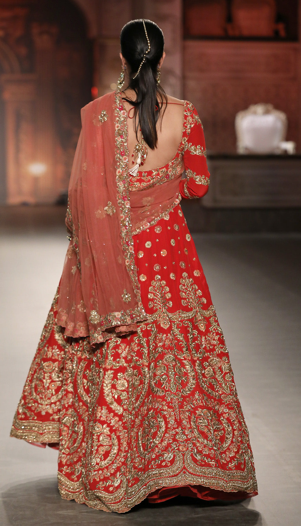 A Fiery Red Crepe Silk Bridal Kalidaar Gown