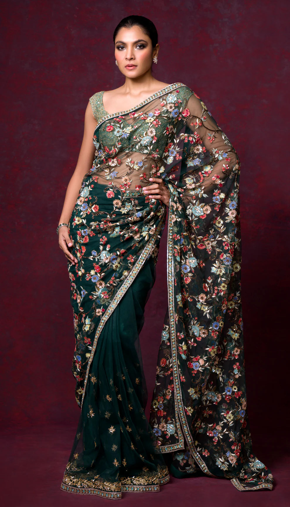 An Emerald Tulle Saree Bejeweled with Florals