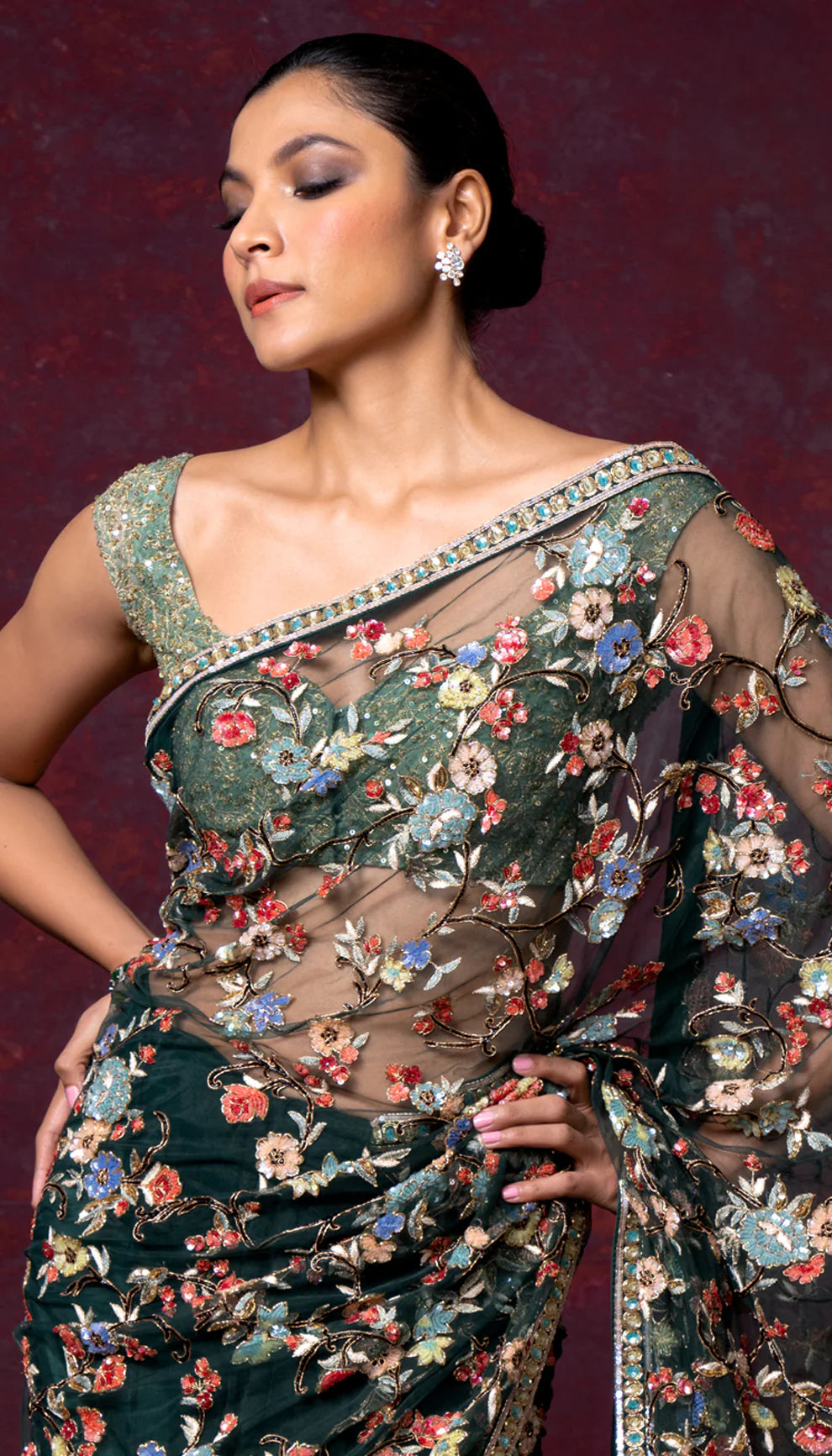 An Emerald Tulle Saree Bejeweled with Florals