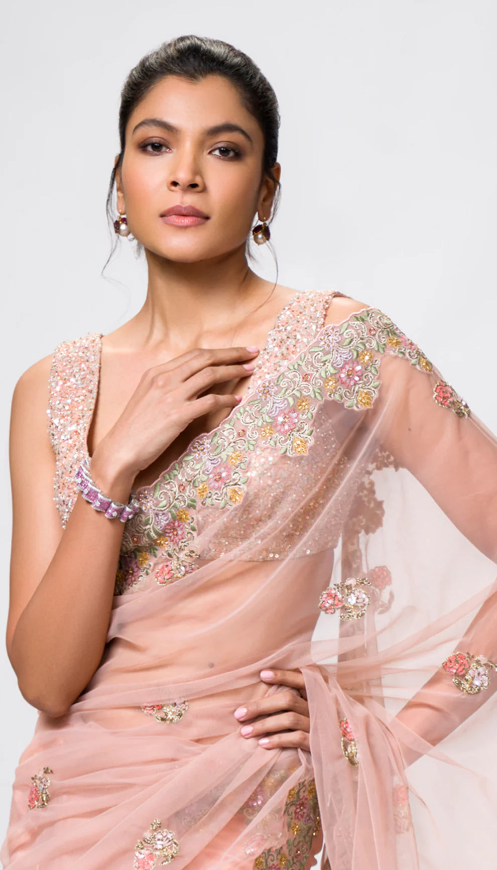 An Exquisite Blush-Pink Tulle Saree Embellished with Multicoloured Threadwork