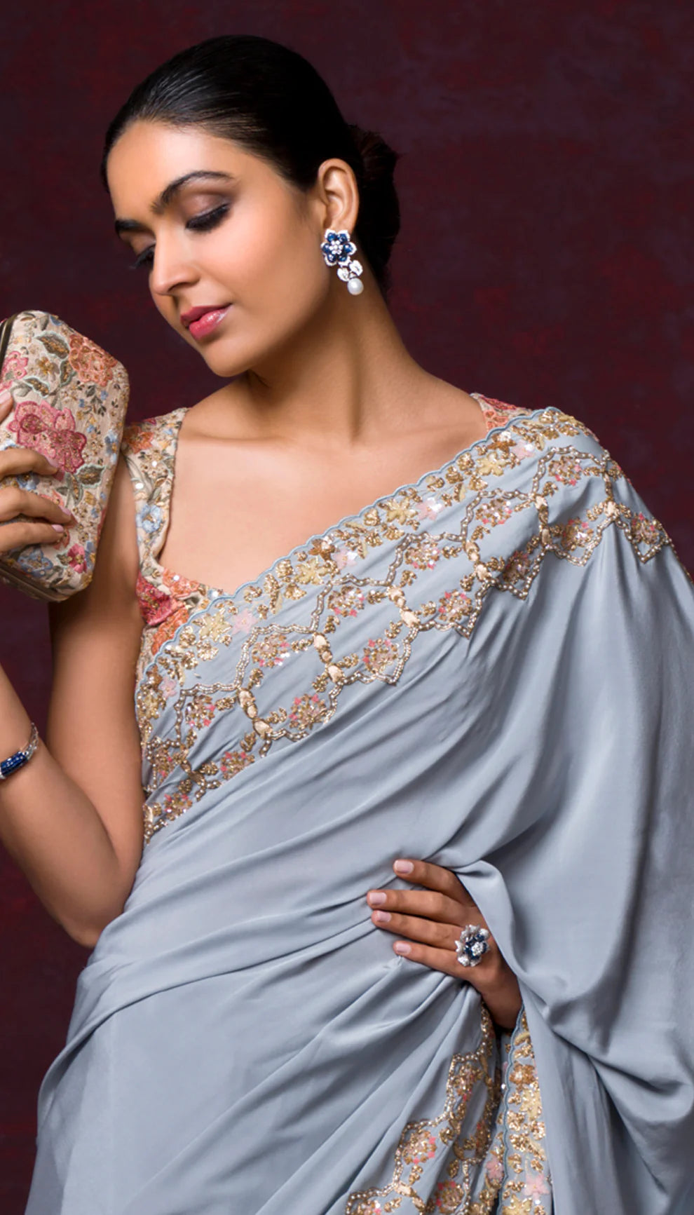 A Perfectly Crafted Powder Blue  Crepe Silk Saree