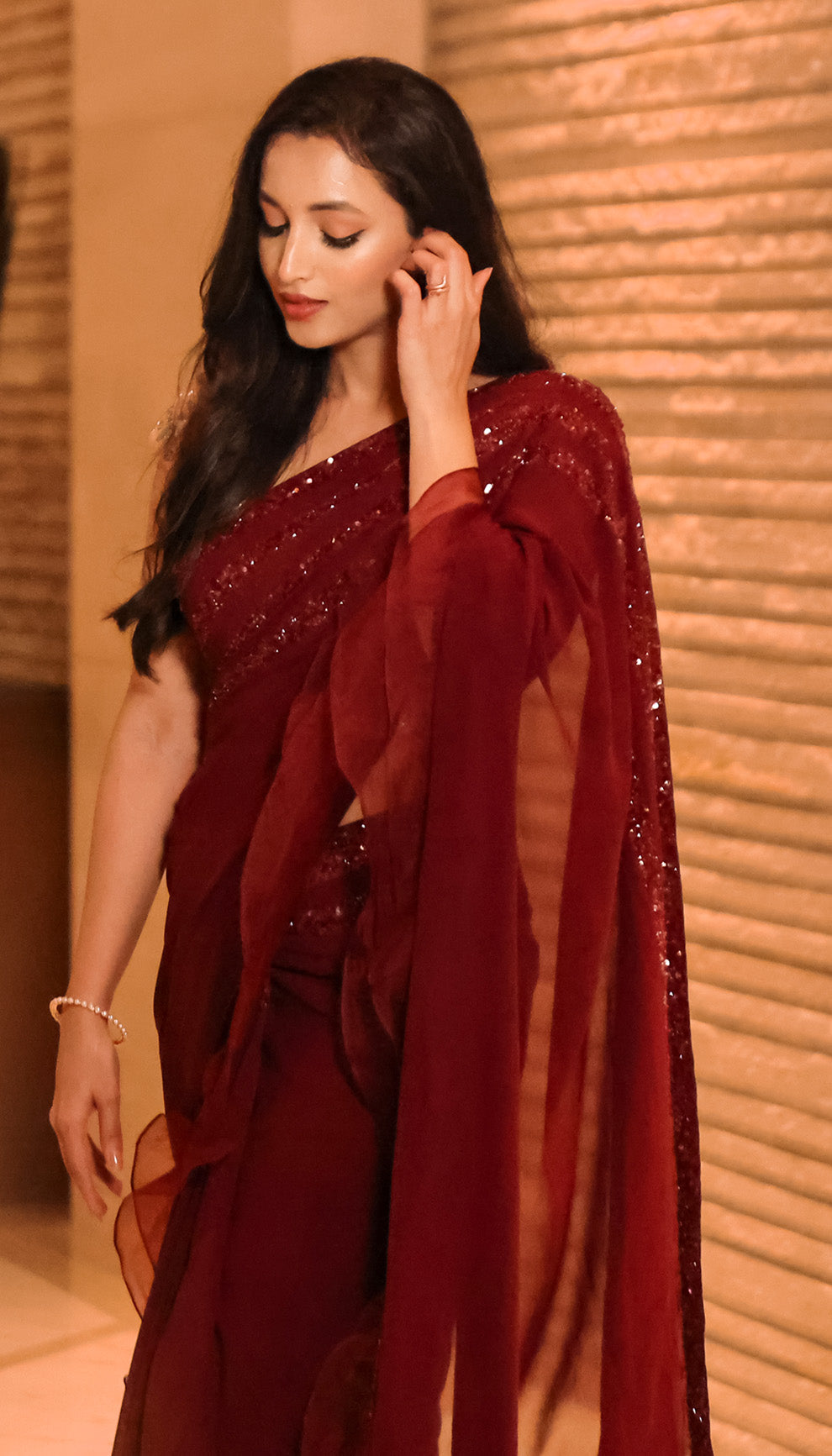 Srinidhi Shetty in Aubergine Georgette Ruffle Saree